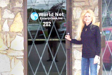 Treva Finley at World Net Enterprises entrance, Cumberland Building Suite 202