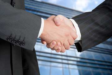 Professional business handshake or family-focused trust image representing World Net Enterprises values